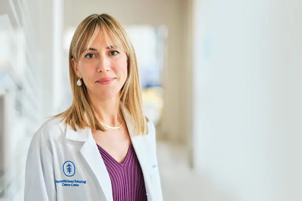 Gastrointestinal medical oncologist Dr. Andrea Cercek stands in an MSK hallway.