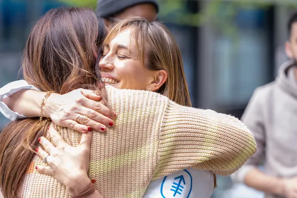 Dr. Andrea Cercek hugs a patient who was treated for rectal cancer in an MSK clinical trial.