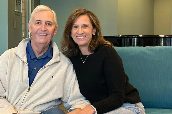 MSK treated Steve Harrold, sitting with his wife, Sara, for throat cancer. 