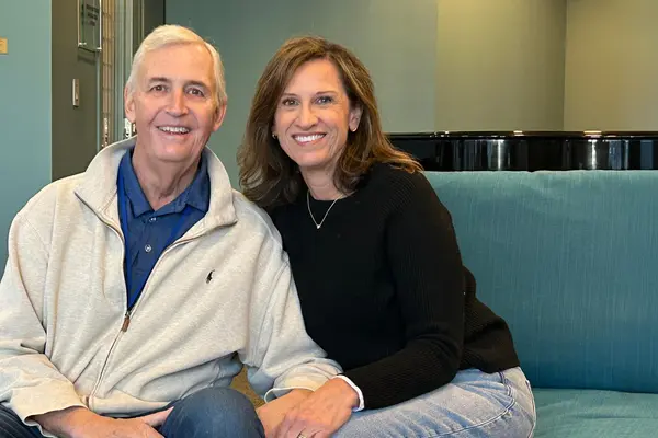 MSK treated Steve Harrold, sitting with his wife, Sara, for throat cancer. 