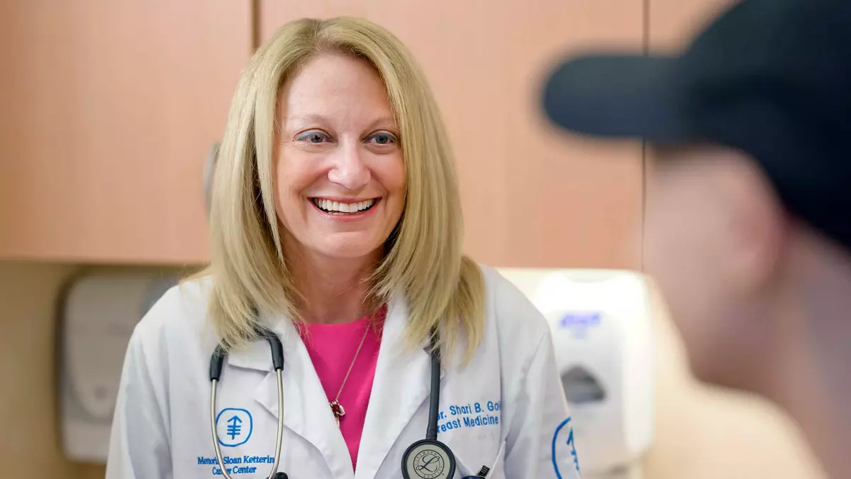 Medical oncologist Dr. Shari Goldfarb with a patient 