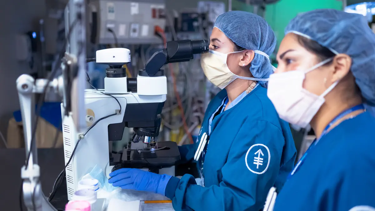 Thoracic surgeon Dr. Alexis Chidi during surgery. 