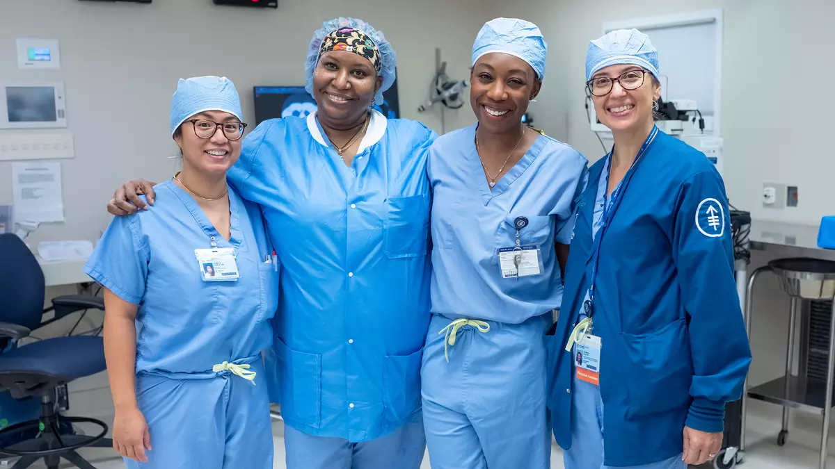 Thoracic surgeon Dr. Alexis Chidi is standing with 3 MSK colleagues. 