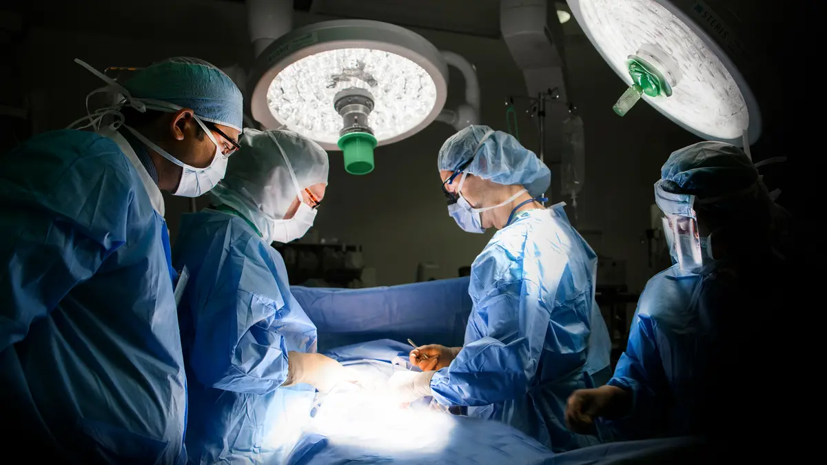 New York City colorectal surgeon Dr. Garrett M. Nash is in an MSK operating room with his surgical team. 