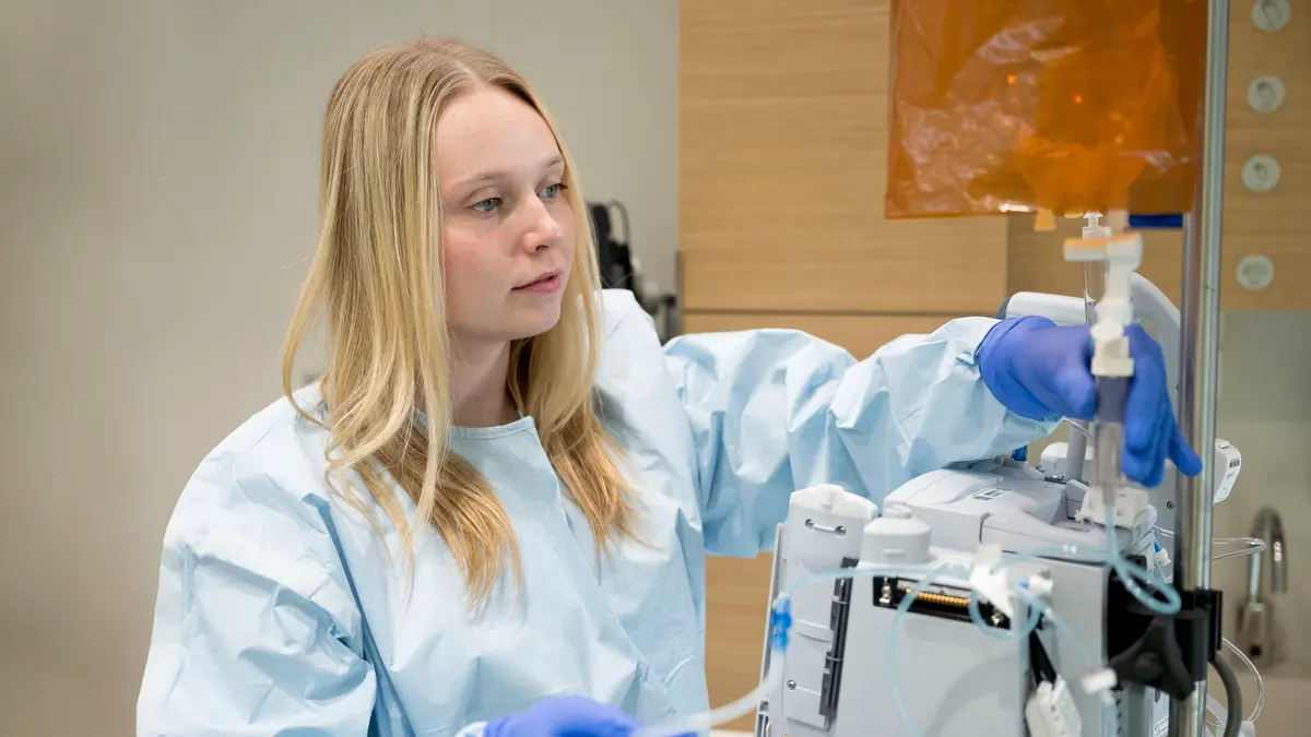 MSK clinical nurse Megan McCue is in an infusion suite at the David H. Koch Center for Cancer Care, preparing treatment. 
