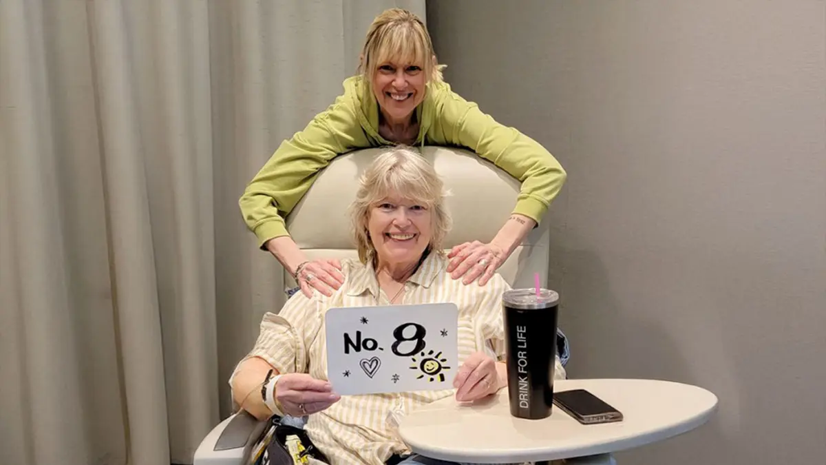 Maureen Sideris, seated and with her sister, is about to have immunotherapy as part of an MSK clinical trial