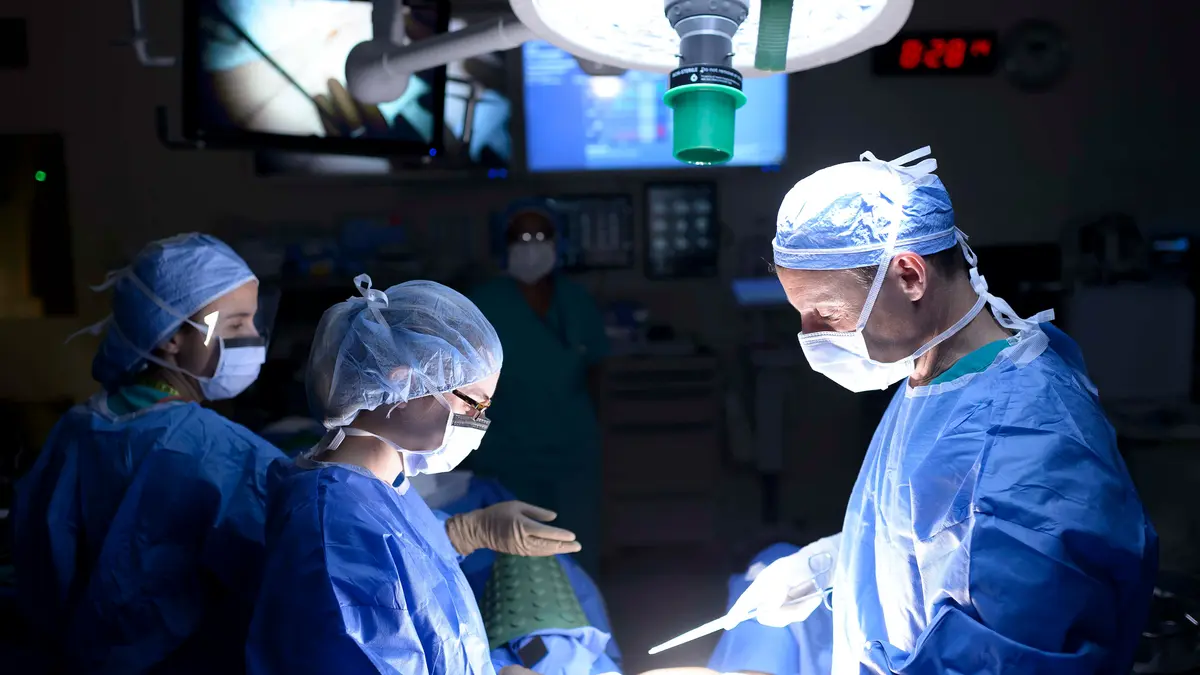 Colorectal surgeon Dr. Martin Weiser, with a surgical team, operates on an MSK patient in New York City. 